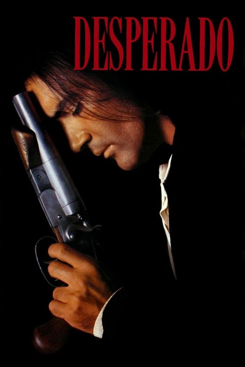 The poster features a man in a dark suit holding a revolver, with the title "DESPERADO" in bold red letters against a black background. The mood is intense and suspenseful, capturing the essence of a classic action thriller.