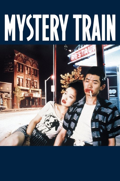 The poster features a couple sitting on a train, with the woman leaning against the man and both looking at the camera. The background shows a dimly lit train station at night, with warm lighting and a red sign that reads "Mystery Train." The overall mood is mysterious and intriguing, with cool b...