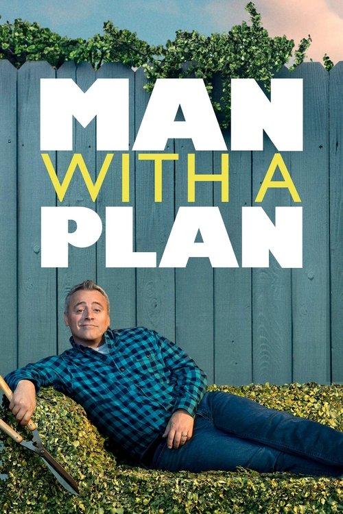 The poster features a man in a blue plaid shirt and jeans lying on a grassy field against a wooden fence. The title "MAN WITH A PLAN" is prominently displayed in bold white and yellow letters. The mood is casual and relaxed, suggesting a humorous or comedic tone.