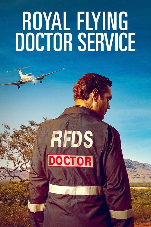 A man in a black uniform with "RFDS DOCTOR" on his back stands in a desert landscape, facing a small airplane flying overhead. The scene captures a serene, sunny day with clear blue skies and distant mountains. The mood is calm and professional, emphasizing the service's dedication to medical care.
