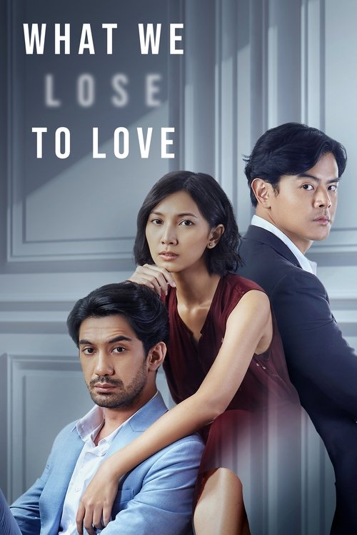 The poster features three characters in a dramatic pose against a muted, formal backdrop. A woman in a red dress leans affectionately on a man in a light blue suit, while a man in a dark suit stands behind her, looking intently forward. The color palette is subdued, with soft grays and muted tone...