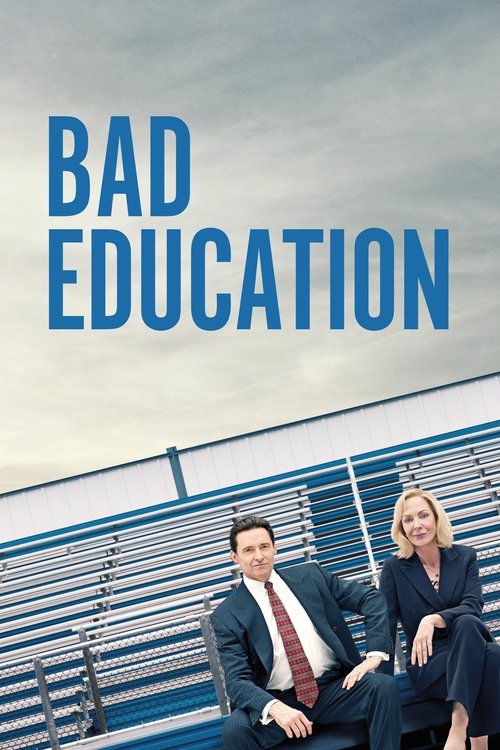 The poster features two business professionals in suits, one seated and one standing, both smiling against a backdrop of blue bleachers. The bold blue text "BAD EDUCATION" dominates the top, evoking a professional yet slightly humorous tone.