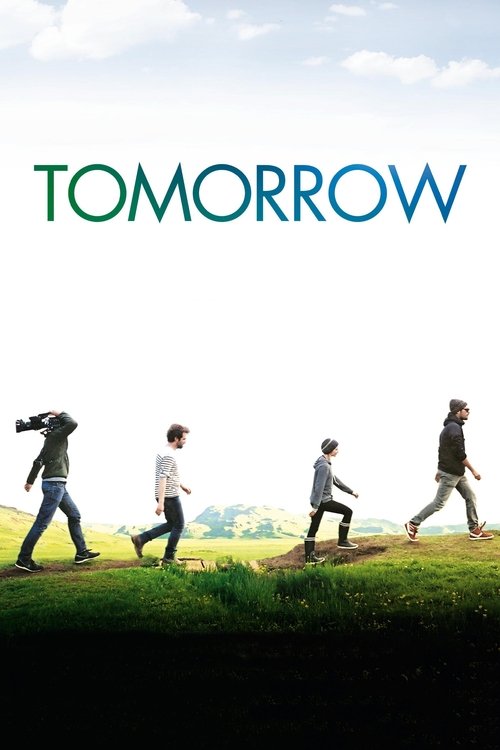 The poster features four children running across a grassy field under a bright sky, evoking a sense of hope and anticipation. The title "TOMORROW" is prominently displayed in bold, teal letters at the top, symbolizing the future. The overall mood is uplifting and energetic, suggesting a journey t...