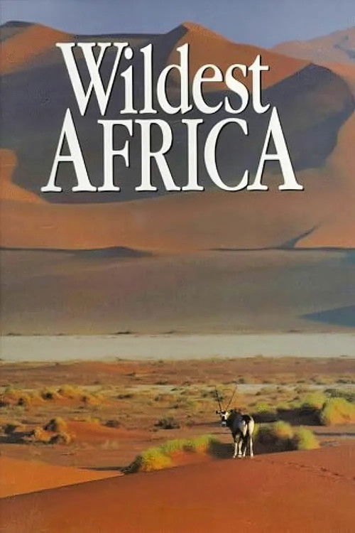 The poster features a vast desert landscape with rolling dunes and sparse vegetation. A lone figure stands in the foreground, adding a sense of scale and solitude. The warm, earthy tones of the sand and mountains evoke a sense of adventure and exploration. The title "Wildest Africa" is prominentl...