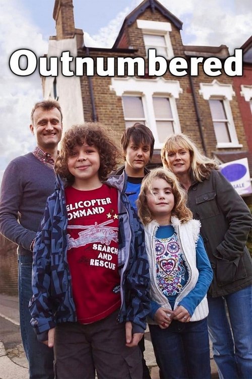 The poster features a family of five standing in front of a charming brick house, exuding warmth and familial love. The vibrant colors of their clothing and the cheerful expressions of the characters create a lively and inviting atmosphere. The title "Outnumbered" is prominently displayed at the ...