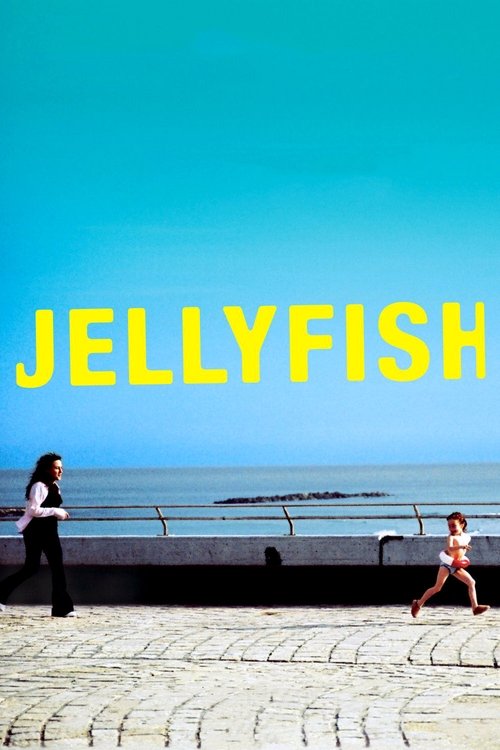 The poster features a serene seaside scene with two figures walking along a cobblestone path under a vibrant blue sky. The bright yellow title "JELLYFISH" stands out prominently against the tranquil ocean backdrop, evoking a dreamy, nostalgic mood.