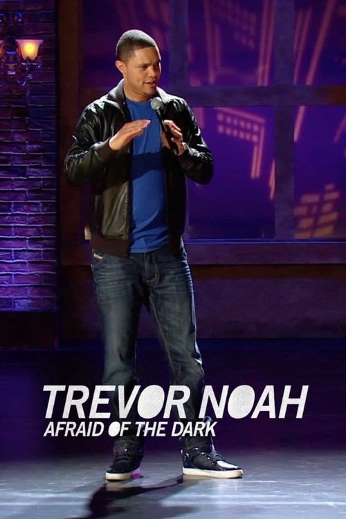 Trevor Noah stands confidently on a dimly lit stage, holding a microphone, embodying the comedic intensity of his role. The dark background with purple hues and the bold white text "Trevor Noah" and "Afraid of the Dark" create a mysterious atmosphere, reflecting the film's serious yet humorous tone.