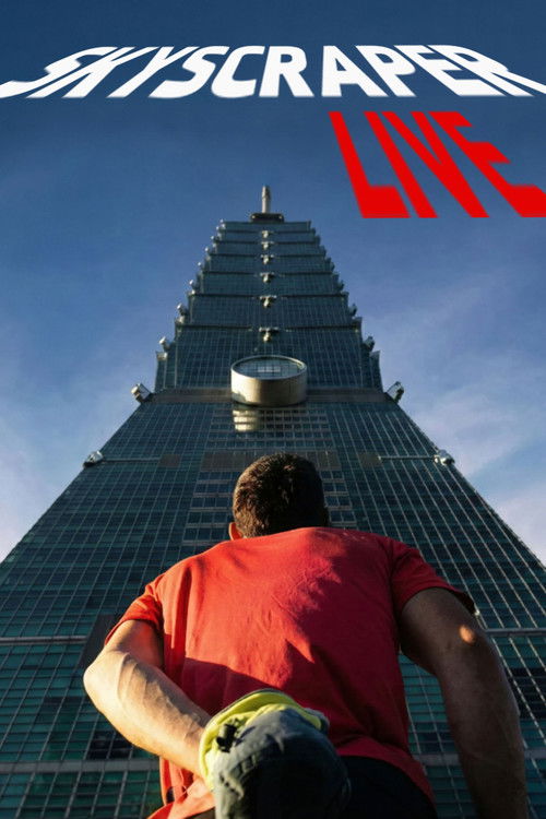 A man in a red shirt stands before a towering skyscraper, evoking a sense of ambition and urban exploration. The vibrant red shirt contrasts with the blue sky and the gleaming glass facade, creating a dynamic and visually striking image.