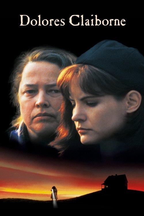 The poster features two women with somber expressions against a dark, moody background. The warm sunset hues create a dramatic and emotional atmosphere, suggesting themes of resilience and hardship. The title "Dolores Claiborne" is prominently displayed at the top, anchoring the visual narrative.