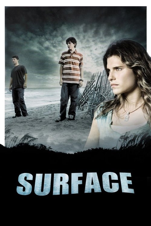 The poster features a somber, moody scene with a woman in the foreground, her expression intense and weathered. Behind her, two figures stand on a desolate beach under a stormy sky, evoking a sense of isolation and despair. The title "SURFACE" is prominently displayed in bold, distressed typograp...