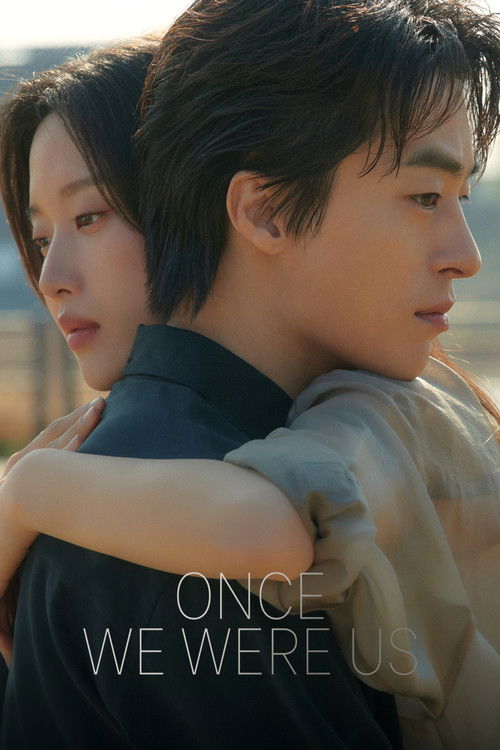 The poster features a tender moment between two young people embracing warmly, with soft golden light illuminating their faces. The muted tones of their clothing and the warm, nostalgic colors evoke a sense of youthful love and connection.