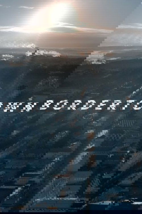 This TV show poster for "Bordertown" captures a serene morning scene with a bright sun rising over a misty landscape. The muted tones of the cityscape and the soft lighting evoke a peaceful, contemplative mood.