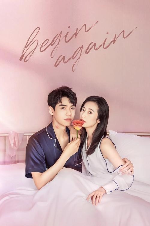 A tender couple shares a romantic moment on a soft pink bed, with the words "Begin Again" elegantly written above them. The warm, dreamy atmosphere captures a sweet, nostalgic feeling.