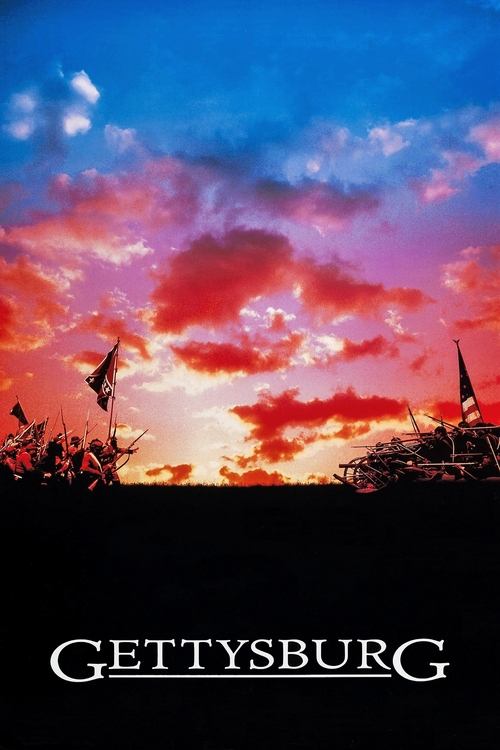 This movie poster captures the solemnity of Gettysburg through a dramatic sunset, with silhouettes of soldiers and flags against a vivid sky. The warm hues of orange, pink, and purple evoke a sense of historical weight and emotional depth.