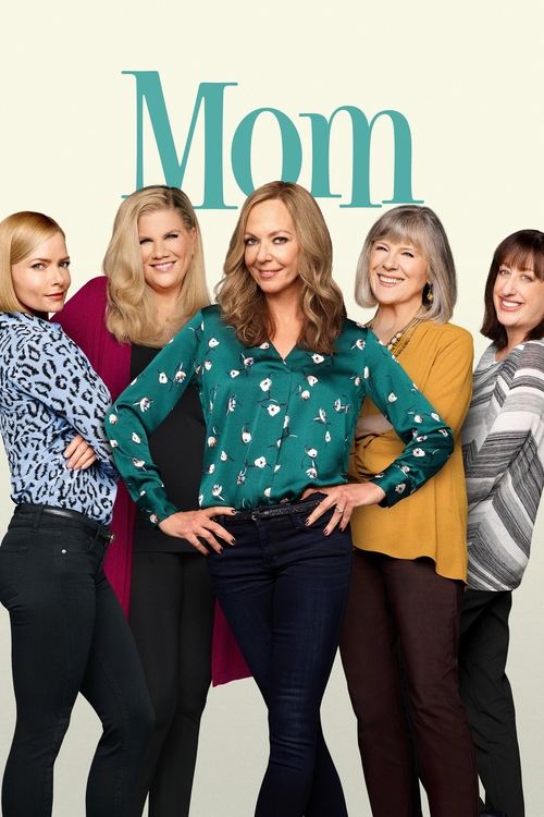 The poster features six women in casual, colorful outfits against a soft beige background, exuding a warm, familial vibe. The teal "Mom" title anchors the composition, while the women’s varied expressions and attire suggest a relatable, everyday family dynamic.