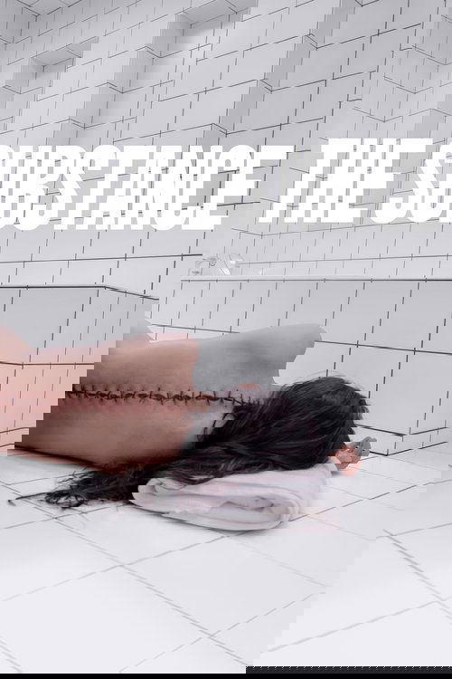The poster depicts a woman with dark hair lying on a white tiled bathroom floor, her body partially covered by a rolled-up towel. The text "THE SUBSTANCE" is prominently displayed in bold white letters against the white background, creating a stark contrast. The overall mood is somber and mysteri...
