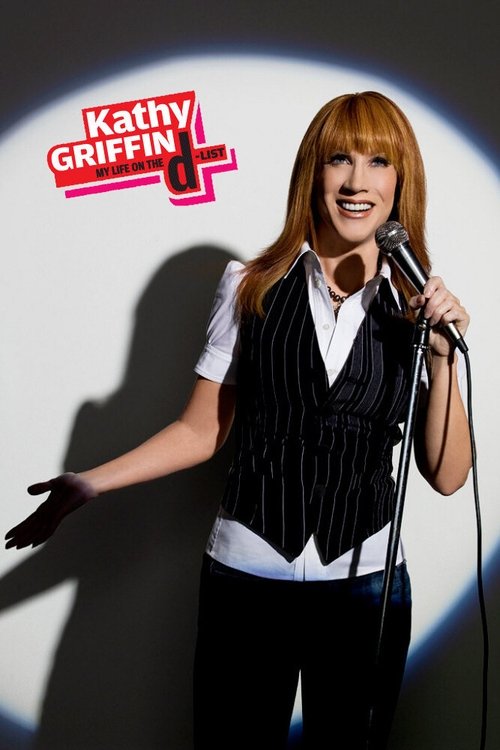 A glamorous Kathy Griffin stands confidently in a black and white striped vest, holding a microphone. The poster features her against a soft white background with a spotlight effect, creating a dramatic and stylish mood. The vibrant pink and red logo adds a pop of color to the image.