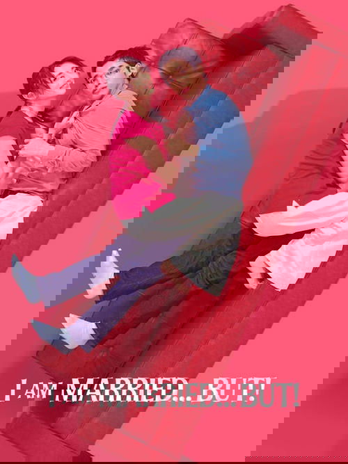 The poster features two characters in a playful pose on a red couch against a vibrant pink background. The characters are dressed casually, with one in a pink shirt and jeans, and the other in a blue shirt and white pants. The mood is lighthearted and fun, suggesting a romantic comedy. The bold t...