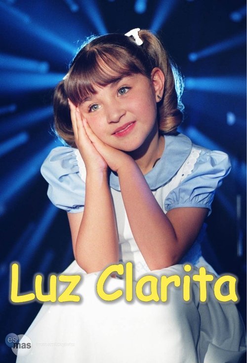 The poster features a young girl with a cheerful expression, her hands resting on her cheeks. She wears a light blue dress with white trim, set against a vibrant blue background with starburst effects. The title "Luz Clarita" is prominently displayed in bold yellow letters at the bottom.