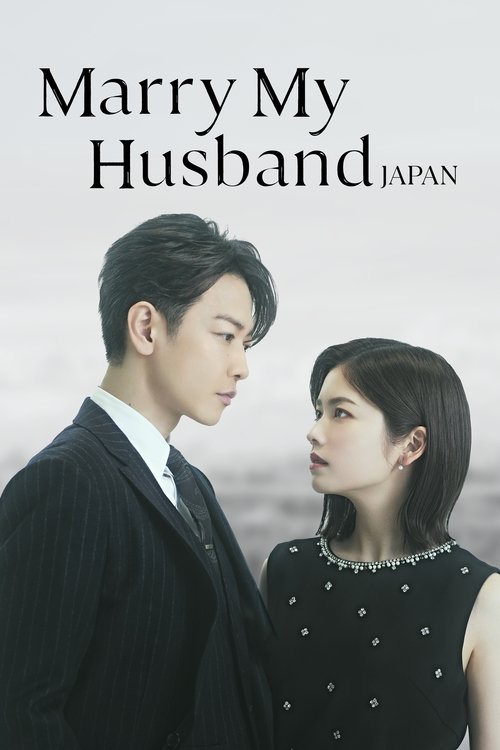 The poster features a man in a dark suit and a woman in a black dress with white polka dots, both looking at each other with expressions of longing and affection. The muted tones and soft lighting create a romantic and slightly melancholic mood, emphasizing the emotional connection between the ch...