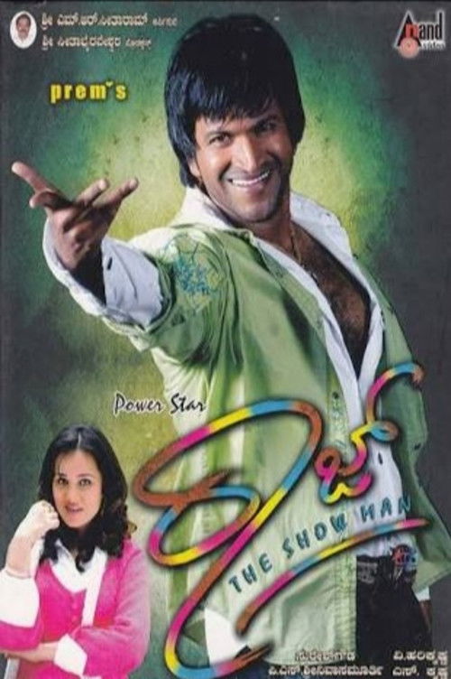 This movie poster features a vibrant green background with a smiling actor in a green shirt, exuding confidence and charisma. A woman in a pink outfit sits to the left, adding a touch of elegance. The colorful title "Raaj" is prominently displayed, emphasizing the film's energetic and adventurous...