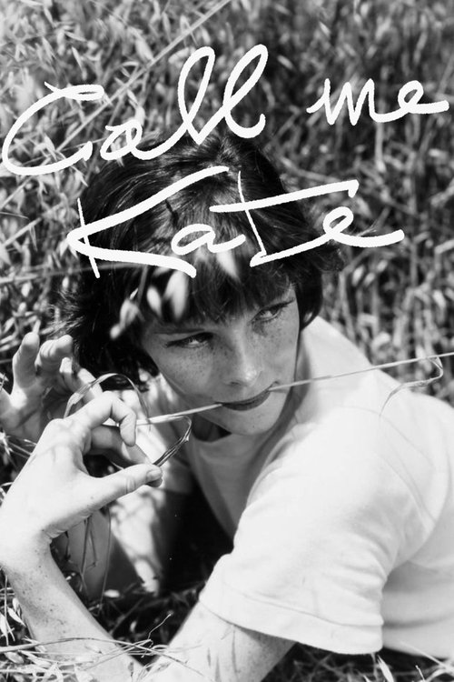 The black-and-white image captures a young man with dark hair and a white shirt, looking directly at the camera with a contemplative expression. The handwritten text "Call me Kate" overlays the scene, adding a personal and nostalgic touch. The mood is introspective and evocative, suggesting theme...