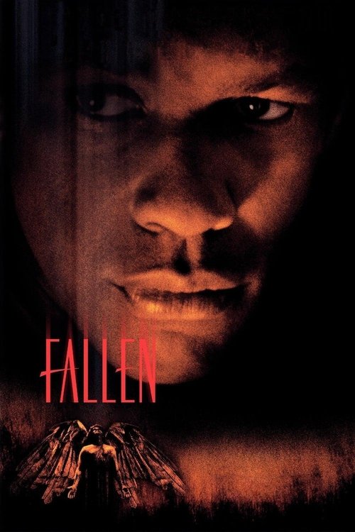The poster features a close-up of a man's face, illuminated by a warm, reddish glow that casts deep shadows. The title "Fallen" is prominently displayed in bold, red letters against the dark background. The overall mood is somber and mysterious, evoking a sense of tragedy and suspense.