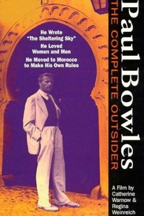 The poster features a man in a white suit against a warm, golden background, evoking a sense of mystery and intrigue. The title "Paul Bowles: The Complete Outsider" is prominently displayed in bold, white lettering, with the tagline "He Wrote 'The Shellshocking Sky'... He Loved Women and Men..." ...