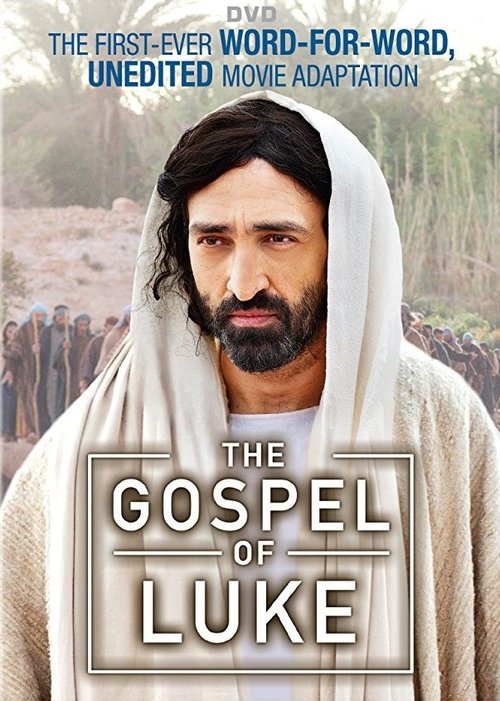 The poster features a man with a beard and white cloth, set against a blurred outdoor scene with warm earth tones. The title "The Gospel of Luke" is prominently displayed in gold lettering, with the tagline above it emphasizing its unedited movie adaptation.