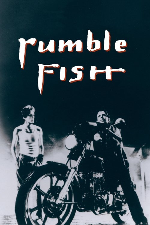 The poster features a gritty, moody scene with two men and a motorcycle against a dark, textured background. The title "Rumble Fish" is prominently displayed in bold, distressed typography. The overall mood is intense and raw, capturing the essence of a classic action film.