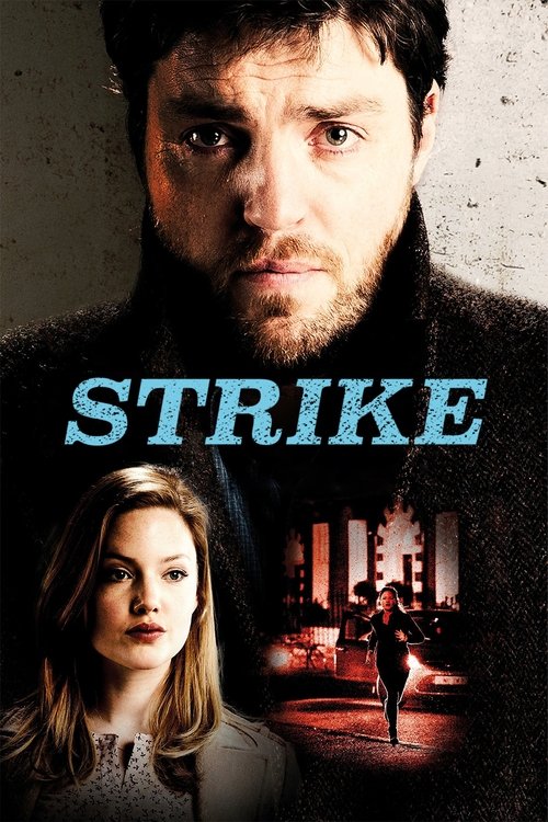 The poster features a dramatic close-up of a man with intense eyes and a beard, set against a gritty, textured background. Below him, a woman with a concerned expression is partially visible. The title "STRIKE" is prominently displayed in bold, blue letters. The overall mood is tense and suspense...