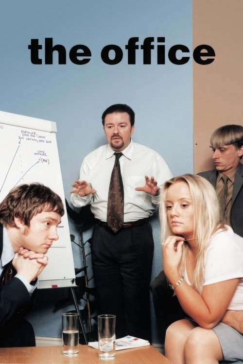 The Office poster captures a humorous office scene with a man in a white shirt and tie gesturing animatedly, surrounded by five colleagues in casual attire. The warm lighting and office setting create a relaxed yet professional atmosphere, reflecting the show's comedic tone.
