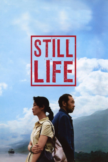 The poster features two people standing against a dramatic sky with clouds and mountains, evoking a sense of longing and introspection. The bold red title "STILL LIFE" stands out prominently, suggesting themes of enduring moments or unfulfilled dreams.