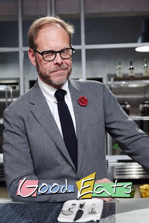 The poster features a man in a gray suit with a red poppy pin, exuding confidence against a blurred kitchen backdrop. The vibrant "Good Eats" logo in colorful letters anchors the bottom, suggesting a lively, inviting culinary theme. The mood is professional yet approachable, appealing to food ent...