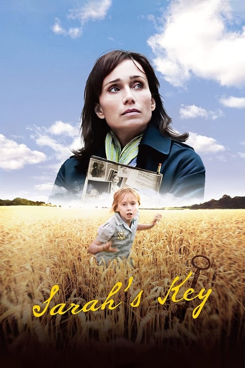 The poster features a woman with a concerned expression against a bright blue sky, while a golden wheat field stretches below. A small child appears in the foreground, adding a sense of innocence and wonder. The warm tones of the wheat contrast with the cool blues, creating a serene yet mysteriou...