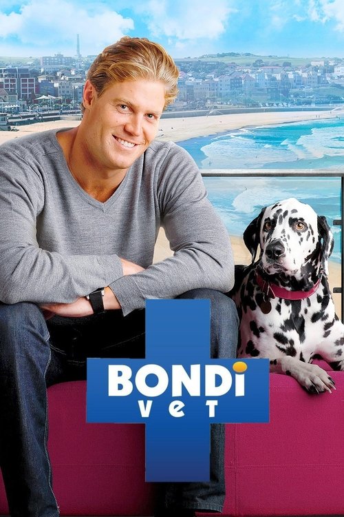A smiling man in a gray sweater sits on a pink couch beside a Dalmatian dog, exuding warmth and friendliness. The vibrant blue and pink tones of the couch and the show's logo create a cheerful, inviting atmosphere.