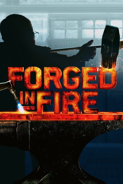 The poster features a silhouette of a person forging metal on an anvil, with intense orange and red flames engulfing the scene. The title "Forged in Fire" is prominently displayed in bold, fiery letters, evoking a sense of danger and intense craftsmanship. The overall mood is dramatic and atmosph...