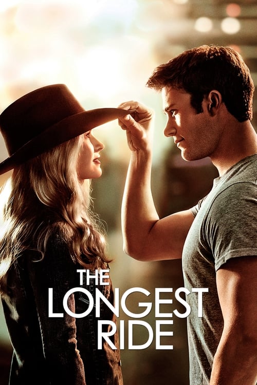 The poster features a romantic couple in warm, golden lighting. The woman wears a stylish hat, while the man gently touches her hair. The title "The Longest Ride" is prominently displayed in bold, white letters against the soft background. The overall mood is intimate and dreamy, capturing the es...