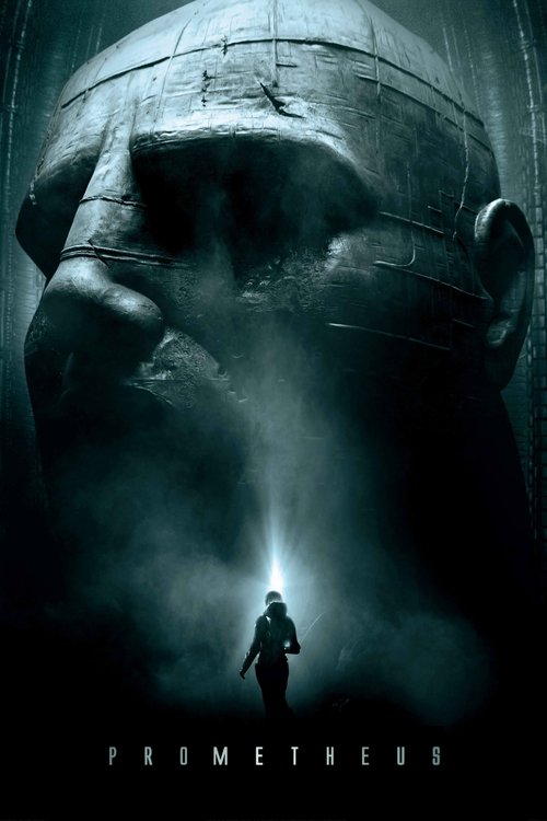 The poster features a colossal, shadowed face looming over a lone figure standing in the dark. The scene is moody and ominous, with a spotlight illuminating the small human against the vast, dark void. The title "Prometheus" is subtly placed at the bottom, hinting at cosmic horror and mystery.