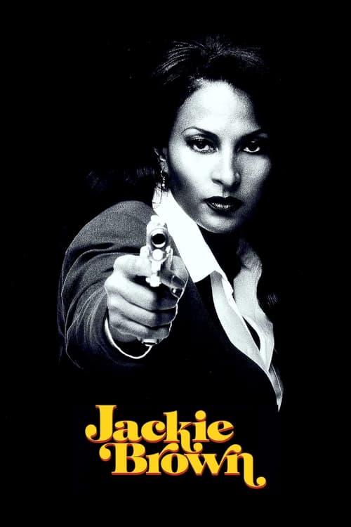 The poster features a woman in a dark suit pointing a gun forward against a stark black background. The title "Jackie Brown" is displayed in bold, golden-yellow text at the bottom. The mood is intense and suspenseful, with high contrast and dramatic lighting.