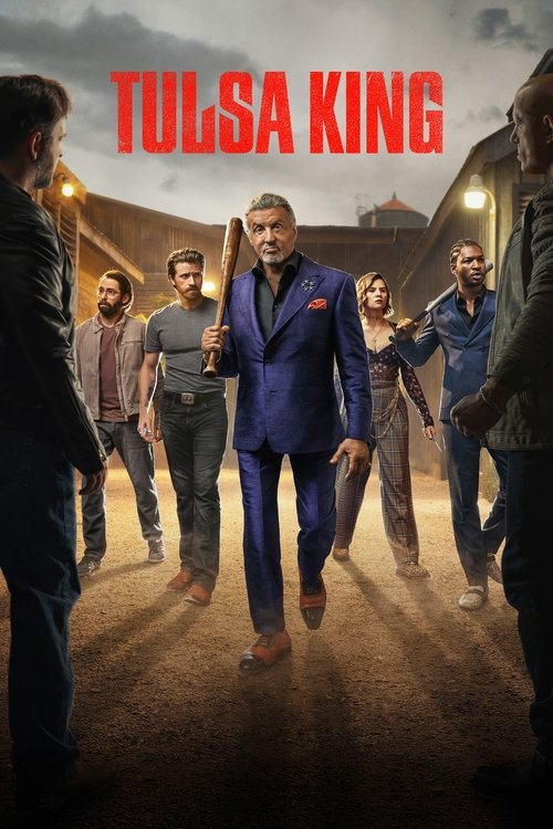 The poster features a man in a blue suit walking confidently toward the viewer, surrounded by a group of men in casual attire. The warm, golden lighting creates a dramatic and tense atmosphere, suggesting a high-stakes drama. The bold red title "TULSA KING" stands out against the muted background...
