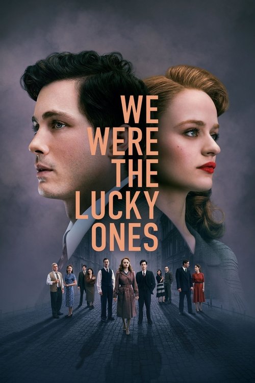 The poster features a dramatic scene with two characters standing on a dark, misty path, their faces illuminated by soft, warm light against a cool, moody background. The title "WE WERE THE LUCKY ONES" is prominently displayed in bold, golden letters, evoking a sense of mystery and intrigue.
