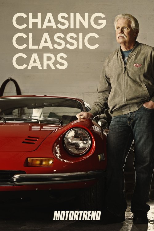 The poster features a man in a casual jacket and jeans standing beside a vibrant red classic car, exuding a relaxed yet passionate vibe. The bold white text "Chasing Classic Cars" dominates the top, while "MOTORTREND" anchors the bottom. The image captures the essence of automotive passion with i...
