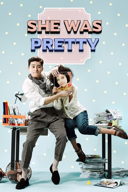 The poster features a couple in a playful pose against a light blue background with white polka dots. The man wears a white shirt and dark pants, while the woman dons a white top and jeans. The title "She Was Pretty" is prominently displayed in pink and blue text. The overall mood is cheerful and...