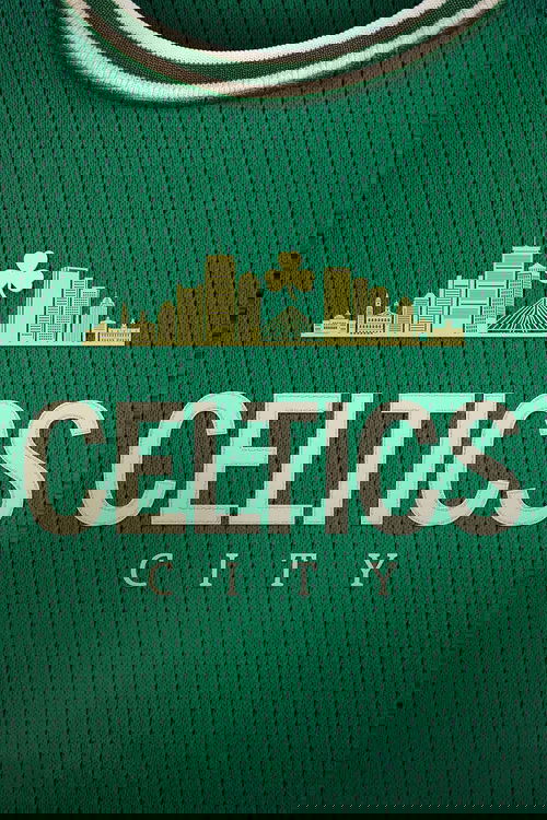 This sports team poster features a vibrant green jersey with the iconic Celtics skyline and a clover emblem. The bold white text "CELTICS CITY" stands out against the textured fabric, evoking a sense of pride and nostalgia for fans of the Boston Celtics.