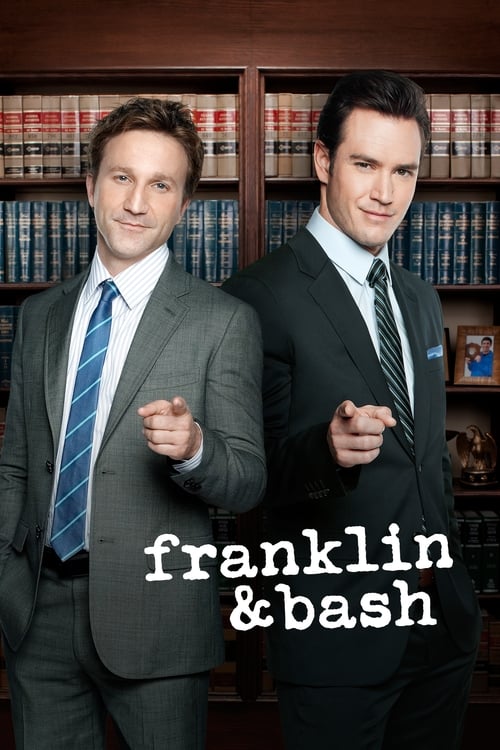 Two men in suits stand in front of bookshelves, pointing forward with confident expressions. The warm lighting and professional attire create a polished, authoritative mood. The title "Franklin & Bash" is prominently displayed in bold white text, emphasizing the show's comedic and authoritative t...