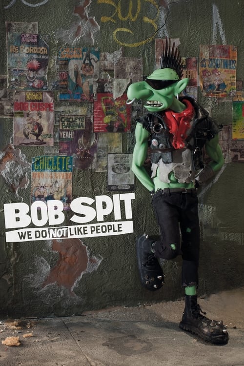 The poster features Bob Spit, a green-skinned character with a punk-rock aesthetic, standing confidently against a backdrop of colorful, cluttered posters. His bold black and red outfit contrasts sharply with the vibrant background, creating a dynamic and energetic visual. The text "Bob Spit" and...