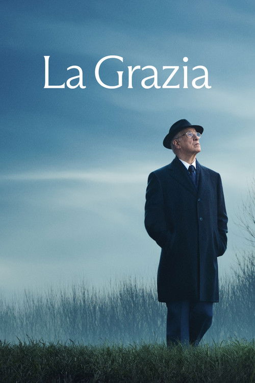 The poster features a solitary man in a dark coat and hat standing against a serene, misty blue sky. His contemplative posture and the soft, ethereal colors evoke a sense of introspection and melancholy, suggesting themes of solitude and introspection.