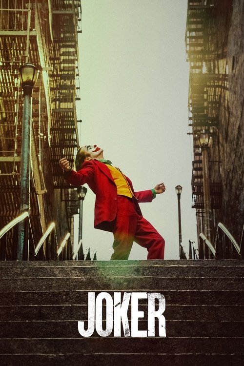 The poster features a Joker in a red suit and yellow jacket, striking a dramatic pose against a backdrop of towering brick buildings. The muted, sepia-toned atmosphere evokes a sense of urban decay and melancholy, while the bold white text "JOKER" anchors the image with a stark, unsettling tone.