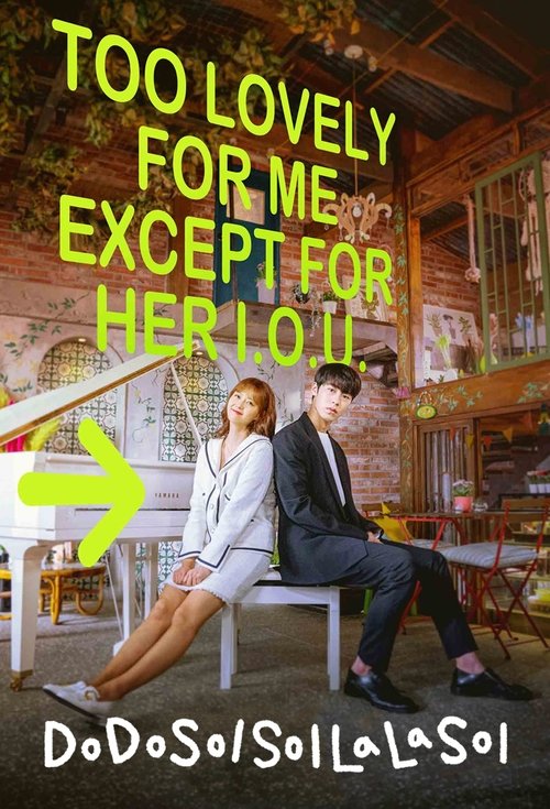 The poster features a romantic couple sitting on a white bench in a warmly lit cafe, exuding a playful and affectionate mood. The vibrant yellow text against the warm tones creates a cheerful and inviting atmosphere, emphasizing the show's lighthearted and fun tone.